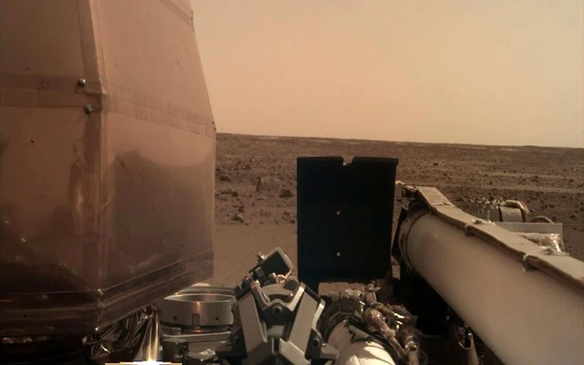 This is the 1st kind photo from NASA's InSight probe subsequently such as it landed on Mars